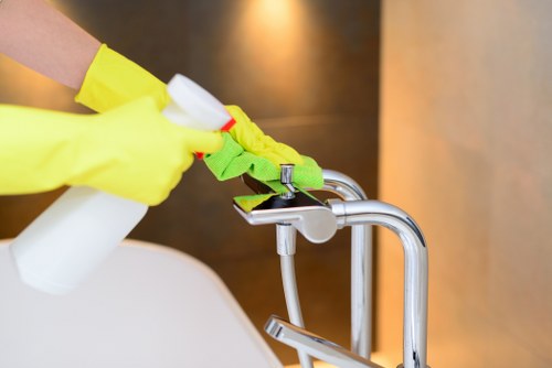 Technician preparing carpet cleaning equipment safely