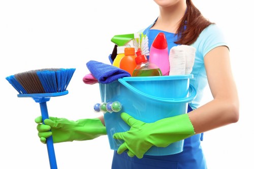 Office cleaners in Ilford refreshing a meeting room and kitchen
