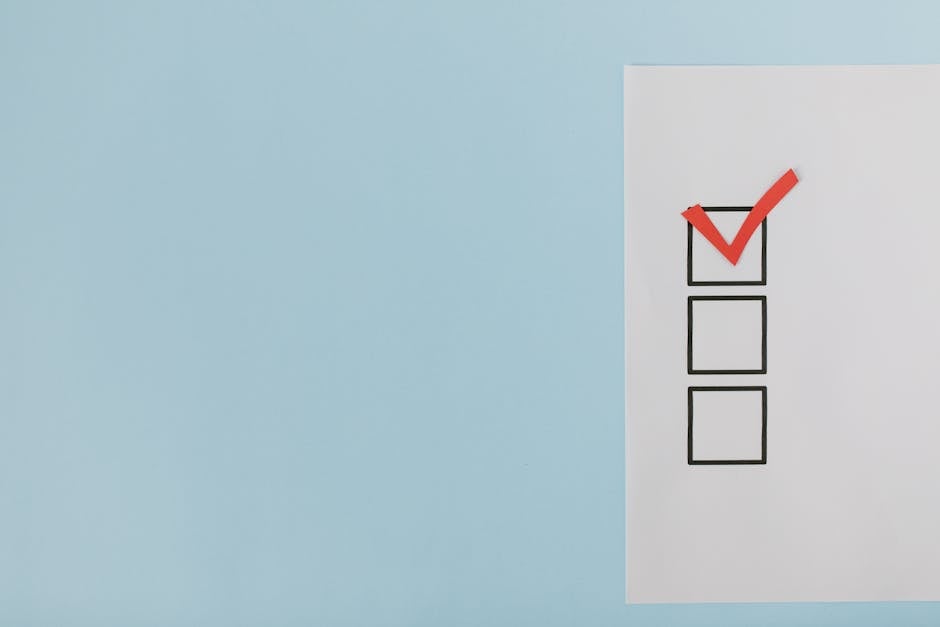 A handwritten apartment checklist pinned with a metal clip on a whiteboard, listing rooms for rent including a living room, bedroom, guest room, kids' room, two bathrooms, and a kitchen, with all item